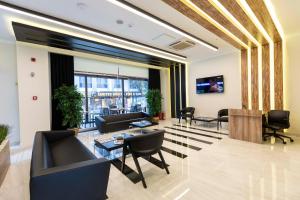 TV a/nebo společenská místnost v ubytování World Point Hotel Besyol