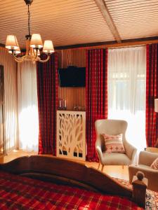 TV a/nebo společenská místnost v ubytování Chalet Blanc