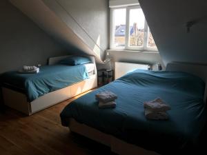 Krevet ili kreveti u jedinici u objektu Sunset Dieppe