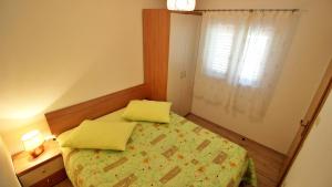 Postel nebo postele na pokoji v ubytování Holiday Home Jozo