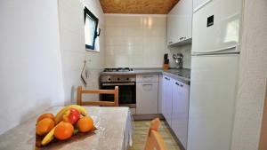 Kuchyň nebo kuchyňský kout v ubytování Holiday Home Jozo
