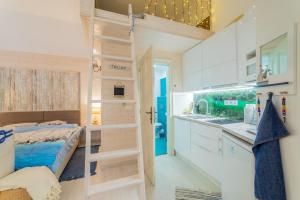 Postel nebo postele na pokoji v ubytování Urban Nest Synagouge Budapest