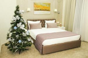 Postel nebo postele na pokoji v ubytování Roxen Hotel&Spa