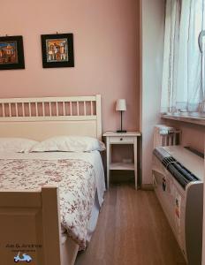 Posteľ alebo postele v izbe v ubytovaní Ale&Andrea Apartments BLU & LILLA