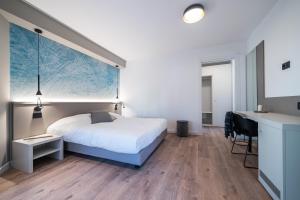 Voodi või voodid majutusasutuse Comfort Zone toas