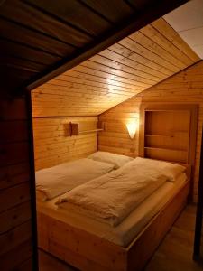 Postel nebo postele na pokoji v ubytování appartementsKOFLER