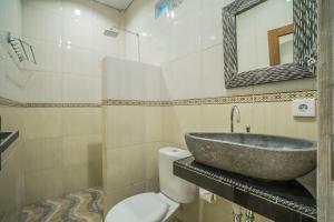 
A bathroom at Adenia House Ubud
