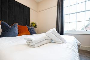 Pages Hotel and Guesthouse客房内的一张或多张床位