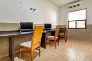 TV a/nebo společenská místnost v ubytování Comfort Inn Chihuahua