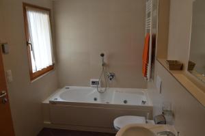 Kúpeľňa v ubytovaní Apartments Bachmann