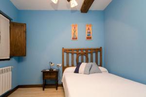A bed or beds in a room at Los Trashumantes