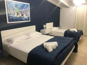 A bed or beds in a room at B & B Vittorio Emanuele