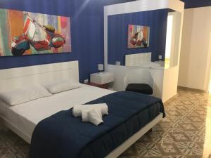 A bed or beds in a room at B & B Vittorio Emanuele