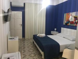 A bed or beds in a room at B & B Vittorio Emanuele
