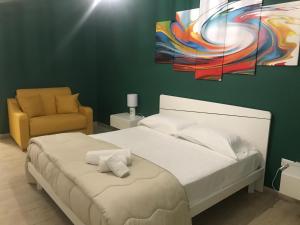 A bed or beds in a room at B & B Vittorio Emanuele