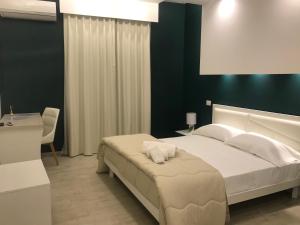 A bed or beds in a room at B & B Vittorio Emanuele