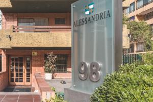 a sign for aissalandzona in front of a building at Alessandria Apart - Coronel Pereira in Santiago