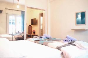 Posteľ alebo postele v izbe v ubytovaní Athens Central 2BD Apartment at Acropolis Plaka