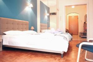 Posteľ alebo postele v izbe v ubytovaní Athens Central 2BD Apartment at Acropolis Plaka