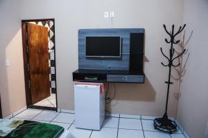 TV a/nebo společenská místnost v ubytování Hospedagem sanloá