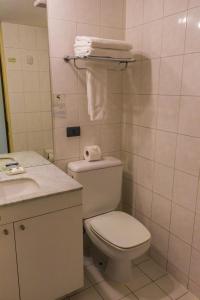 Ванная комната в Alessandria Apart - Coronel Pereira