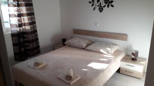 Posteľ alebo postele v izbe v ubytovaní Holiday Home Luka