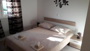 Posteľ alebo postele v izbe v ubytovaní Holiday Home Luka