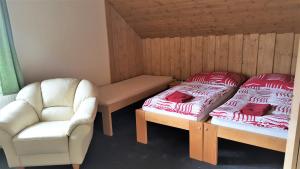Postel nebo postele na pokoji v ubytování Apartmány Sára
