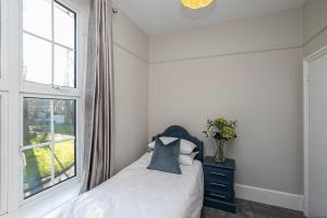 Pages Hotel and Guesthouse客房内的一张或多张床位