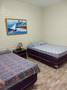 Porto dos Lencóis - Chalé Tipo Apartamento客房内的一张或多张床位