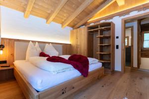 Posteľ alebo postele v izbe v ubytovaní Birnbaum Chalets Grossarl