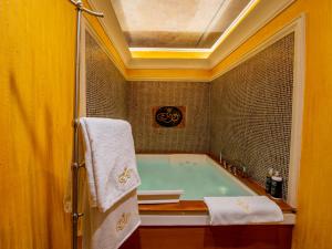 Posteľ alebo postele v izbe v ubytovaní EGO' Boutique Hotel - The Silk Road