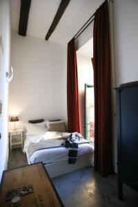 Ένα ή περισσότερα κρεβάτια σε δωμάτιο στο B&B Salerno al Duomo