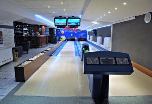 an empty bowling alley in a mall at Hotel Sport in Bełchatów