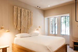 Ένα ή περισσότερα κρεβάτια σε δωμάτιο στο Casa Pancha