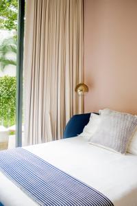 Un ou plusieurs lits dans un hébergement de l'établissement Il Buongustaio