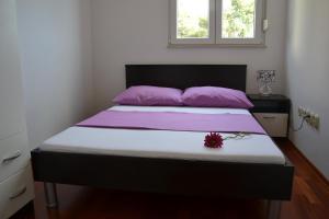 Apartment Marin2- near beach tesisinde bir odada yatak veya yataklar