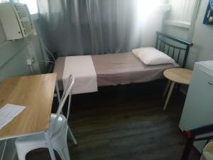 Mumma's Hostel Cairns客房内的一张或多张床位