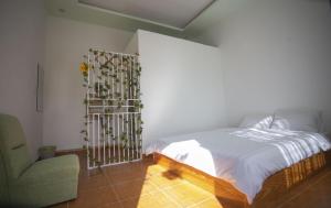 Postel nebo postele na pokoji v ubytování Giao Giao House Homestay