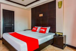 Cama o camas de una habitación en OYO 447 Royal Express Hua Hin