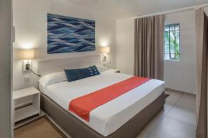Astroea Beach Hotel客房内的一张或多张床位
