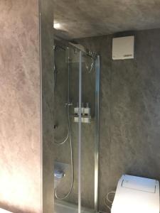 Vannituba majutusasutuses Hotel 草石庵