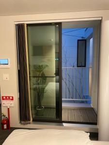 Foto sihtkohas Osaka asuva majutusasutuse Hotel 草石庵 galeriist