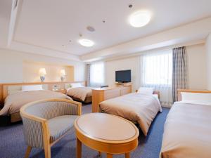 Ένα ή περισσότερα κρεβάτια σε δωμάτιο στο Hotel Grand Terrace Obihiro +174 φωτογραφίες
