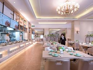 Restavracija oz. druge možnosti za prehrano v nastanitvi Vienna International Hotel (Changfeng Park Shop, Jinshajiang Road, Shanghai)