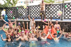 a group of people in a swimming pool at Mad Monkey Bangkok in Bangkok