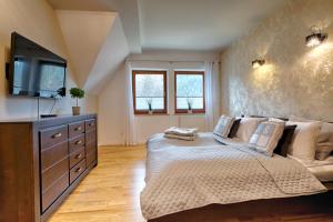Posteľ alebo postele v izbe v ubytovaní Apartament Bystra Woda 29 komfortowy centrum