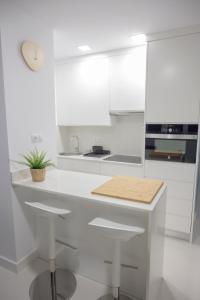 Kuchyňa alebo kuchynka v ubytovaní Apartamento Luis Morote Plaza Santa Catalina