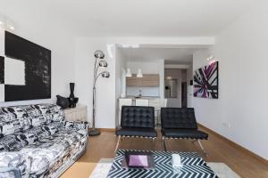 Posezení v ubytování Luxury villa Punat with pool with sea view , 50m from the beach by WiiBuk
