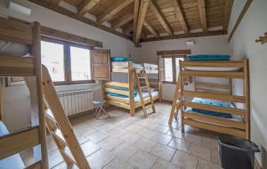 A bunk bed or bunk beds in a room at Santa Brigida - Real 19